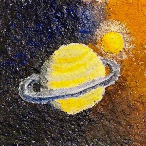 The unexplored planet. Credit: Maria Tokareva. The painting is made of recycled paper, cardboard, glue and has i volumetric objects. The planet Saturn and one of its satellites - Titan - are depicted. This whole picture is illuminated by the sun.